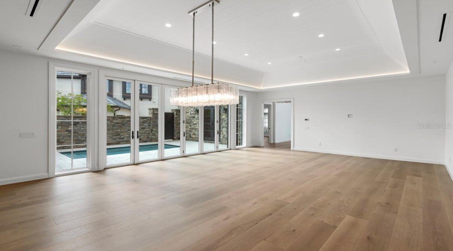 Open concept living space with dining and gourmet kitchen