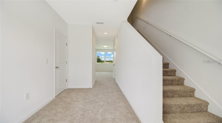 Upstairs you'll find three bedrooms. Living area is downstairs.