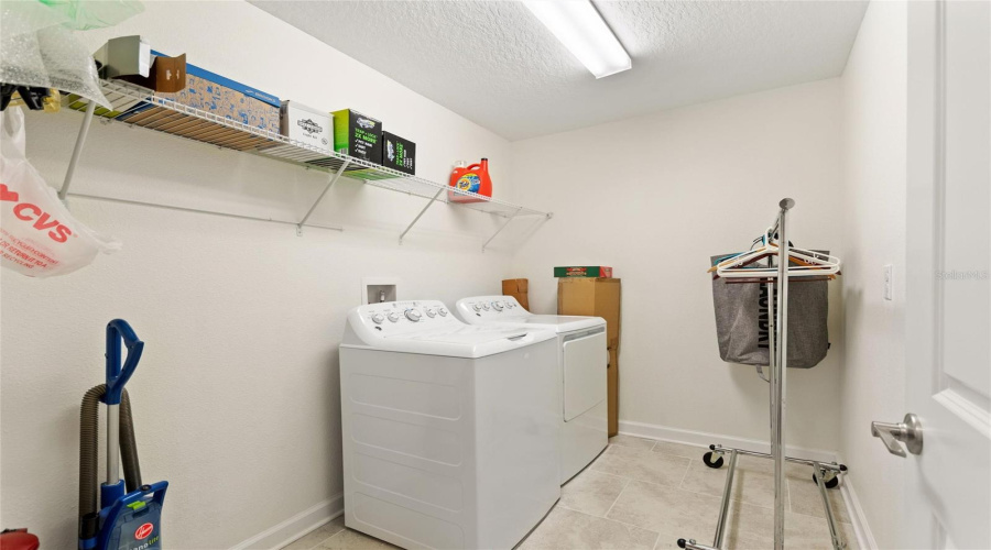 CHAMPIONS GATE, Florida 33896, 5 Bedrooms Bedrooms, ,4 BathroomsBathrooms,Residential,For Sale,OLYMPIC CLUB,0,MFRS5153490
