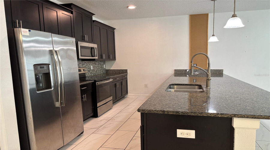 Davenport, Florida 33896, 4 Bedrooms Bedrooms, ,3 Bathroomsbathrooms,Residential,For Sale,Moon Valley,0,Mfro6426051