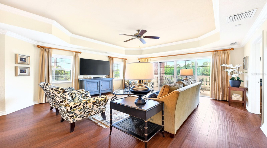A wall of sliding glass doors opens to a spacious open concept living area.