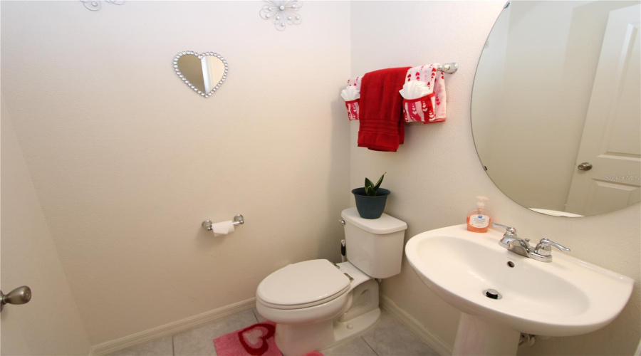 Convenient first-floor half bathroom.