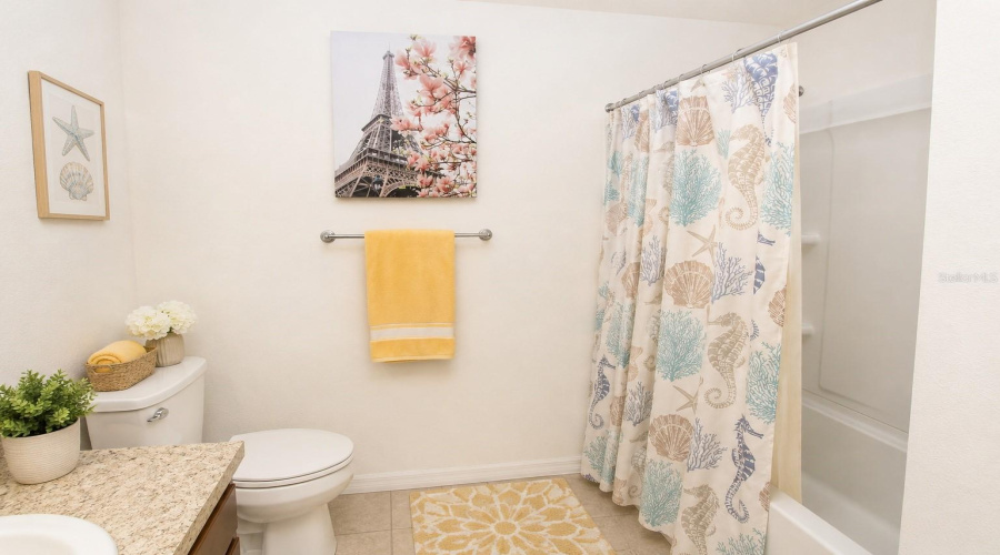 Spacious upstairs family bathroom complete with a bathtub and shower combination.
