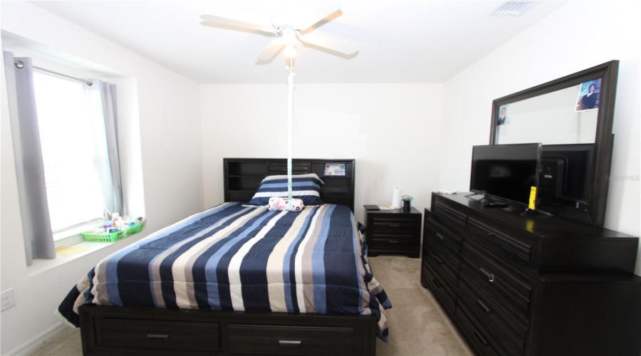 Bedroom 1 overlooks the front of the property with views of the street.