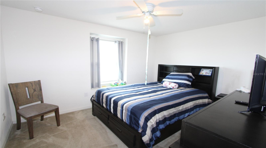 Bedroom 1 overlooks the front of the property with views of the street.
