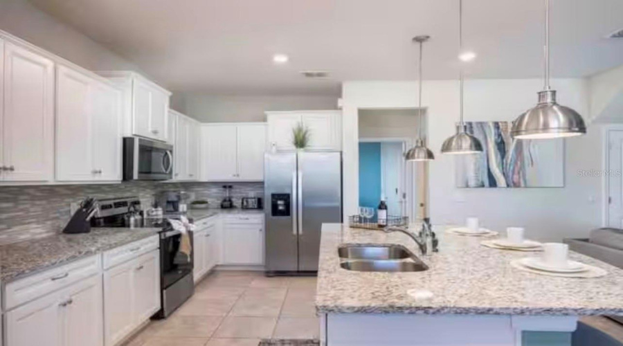 DAVENPORT, Florida 33897, 5 Bedrooms Bedrooms, ,4 BathroomsBathrooms,Residential,For Sale,LELANI,0,MFRO6373772