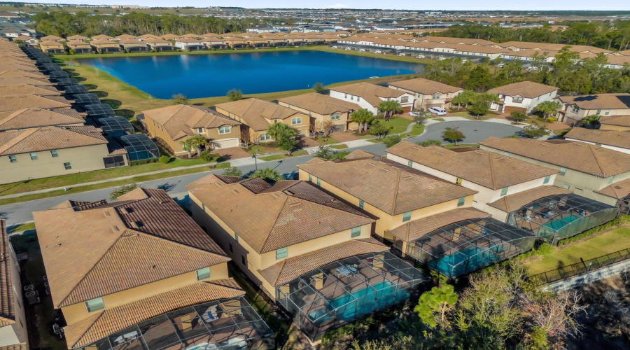 Aerial view of the property and the community