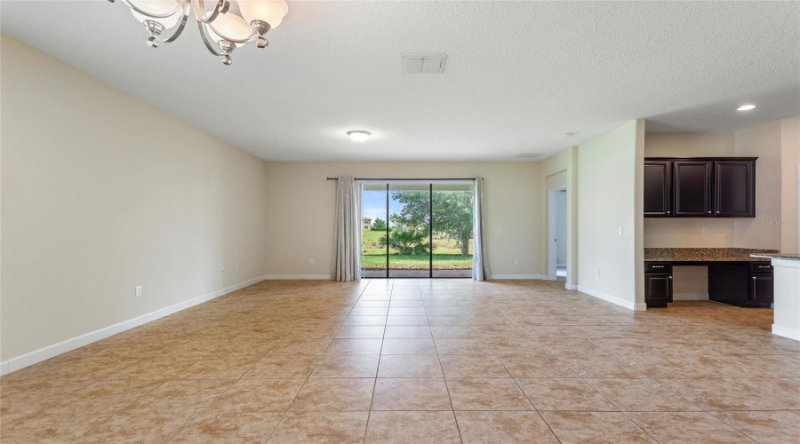 Family room with sliding glass door to rear patio.