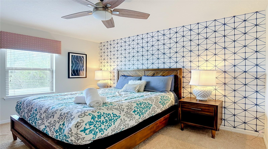 Spacious guest bedroom with stylish décor