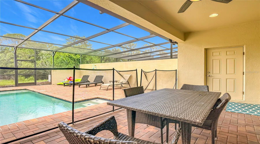 Covered lanai overlooking the private pool & pond