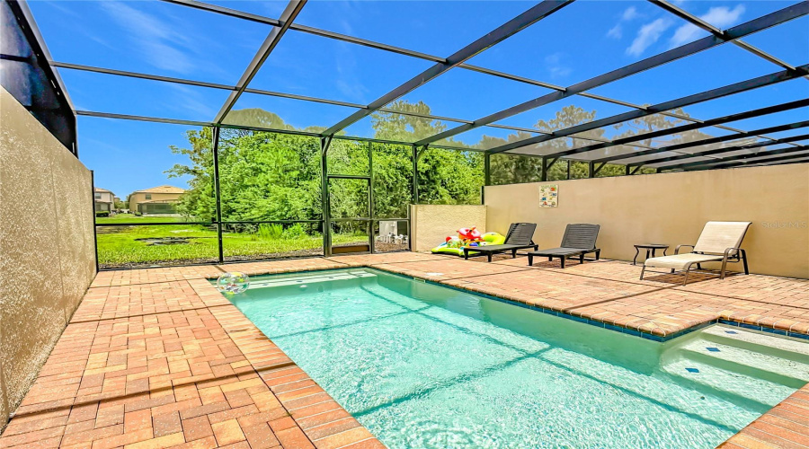 Enjoy Florida living with no rear neighbors across the pond
