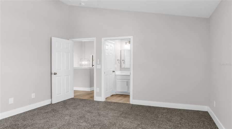 Bedroom 5 with ensuite bath also accessible from hallway