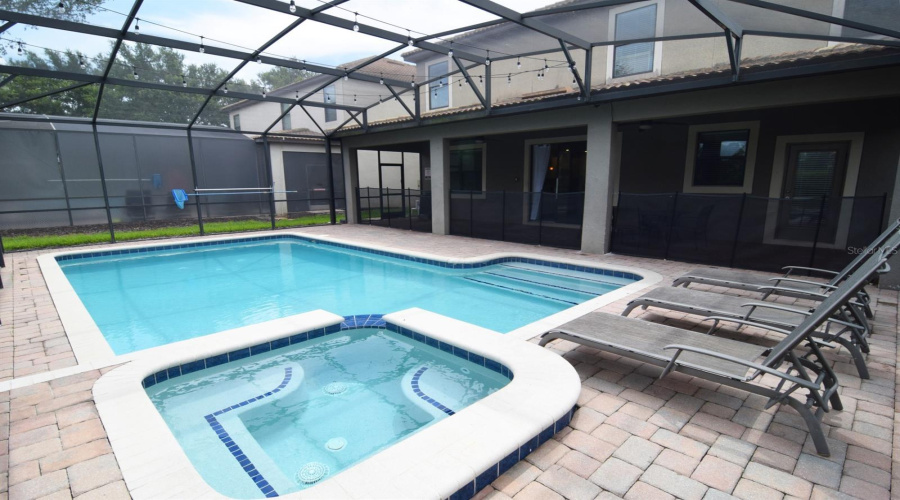 Private pool deck with spa & shaded dining area