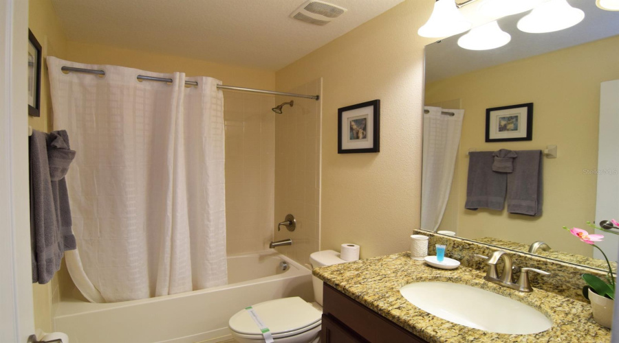 Family bathroom with tub/shower