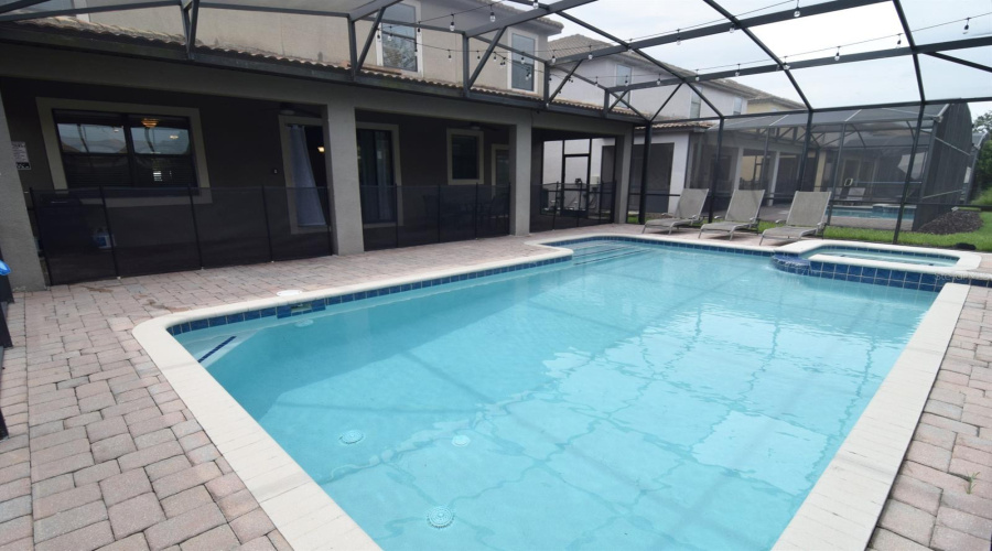Private pool deck with spa & shaded dining area