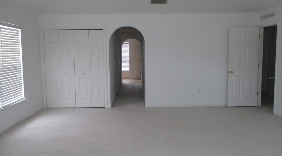 Master Bedroom view entrance to closets and bathroom