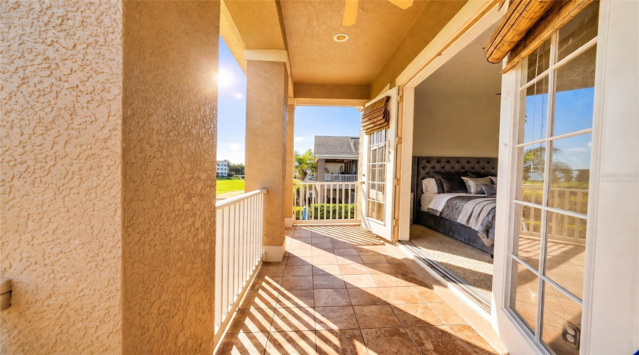 Balcony of Primary Bedroom Facing The Golf Course-Virtually Staged