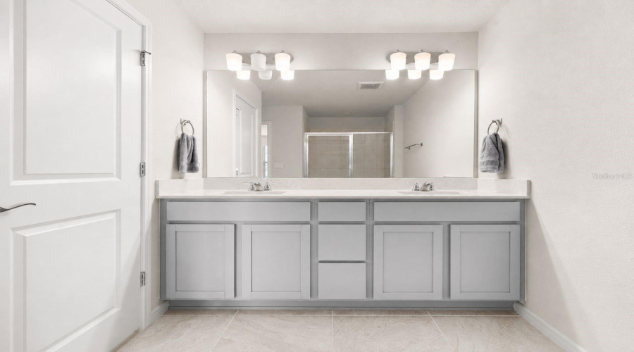 Primary Bathroom with dual vanity sinks