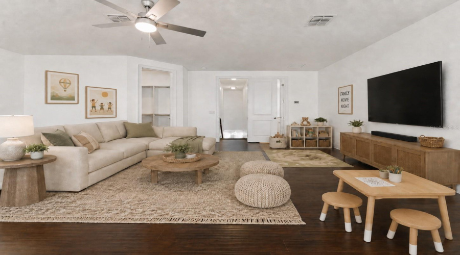 Versatile upstairs loft that can serve as a flex room, media space, playroom, home office, or optional fifth bedroom.