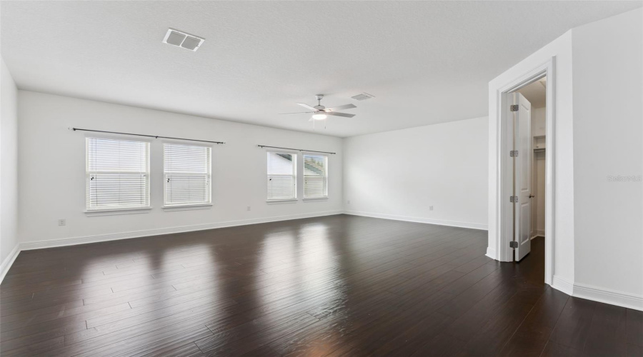Versatile upstairs loft that can serve as a flex room, media space, playroom, home office, or optional fifth bedroom.