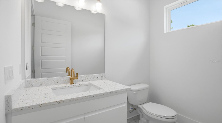 Half Bathroom From Pool Area