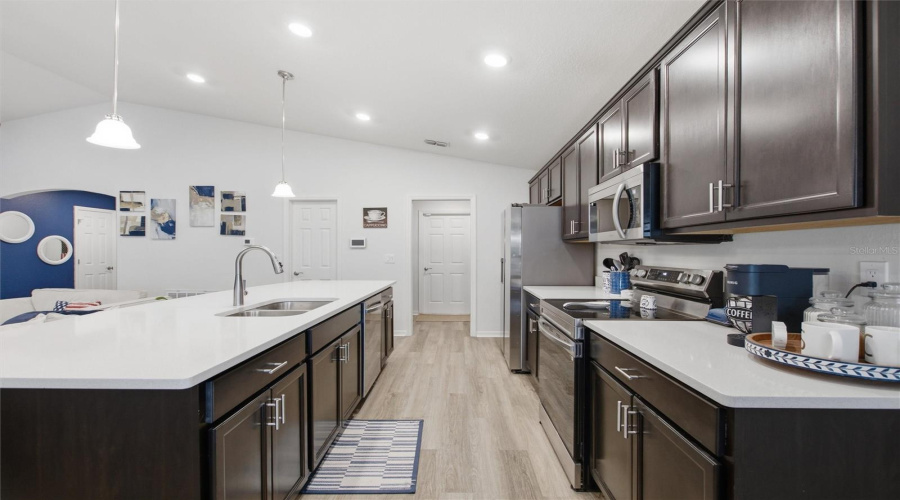 Luxury Kitchen with Silestone Counters and Espresso Cabinets