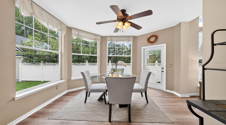 SunRoom with Large Windows overlooking conservation area