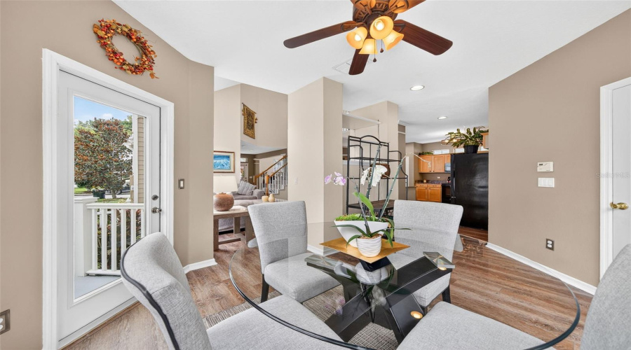Sitting in Sun Room looking into Great Room and Kitchen