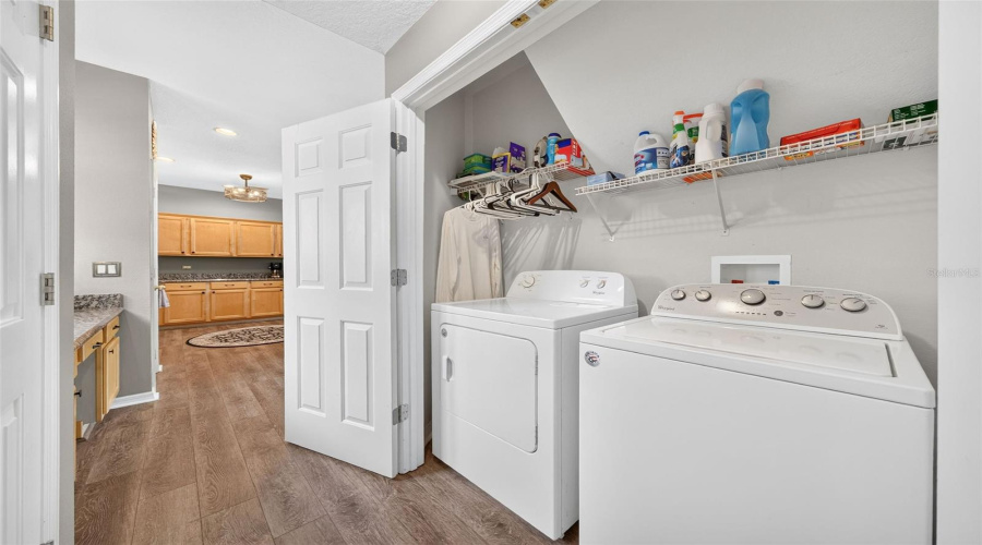 Laundry Area between Kitchen and Dining Room