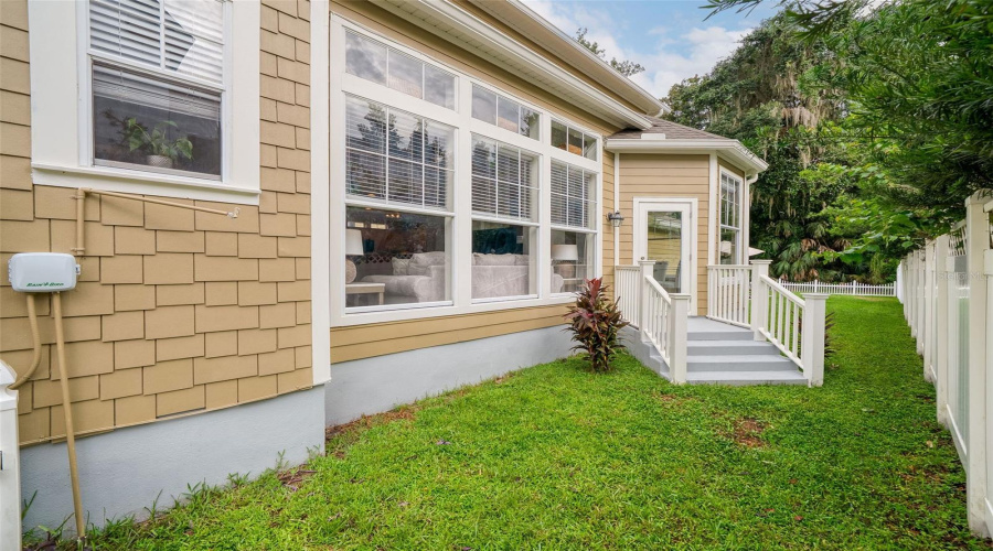 Sunroom entrance and side yard