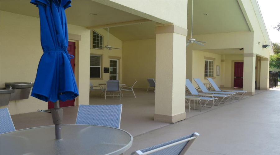 Community Clubhouse exterior resting area by the Pool