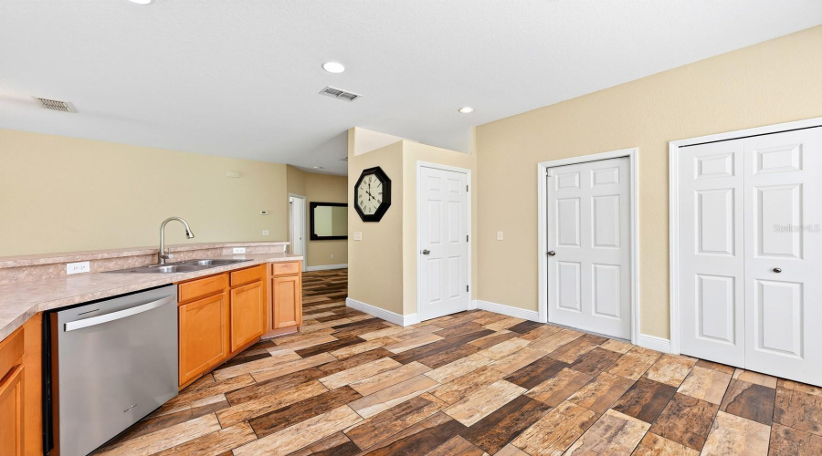 A closet in the Kitchen keeps the New Washer and Dryer conveniently tucked away.