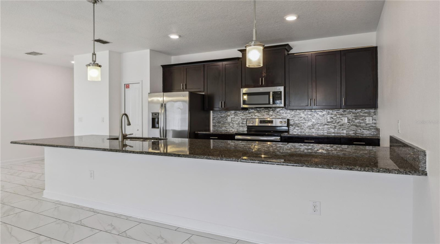 Kitchen cabinetry with crown molding