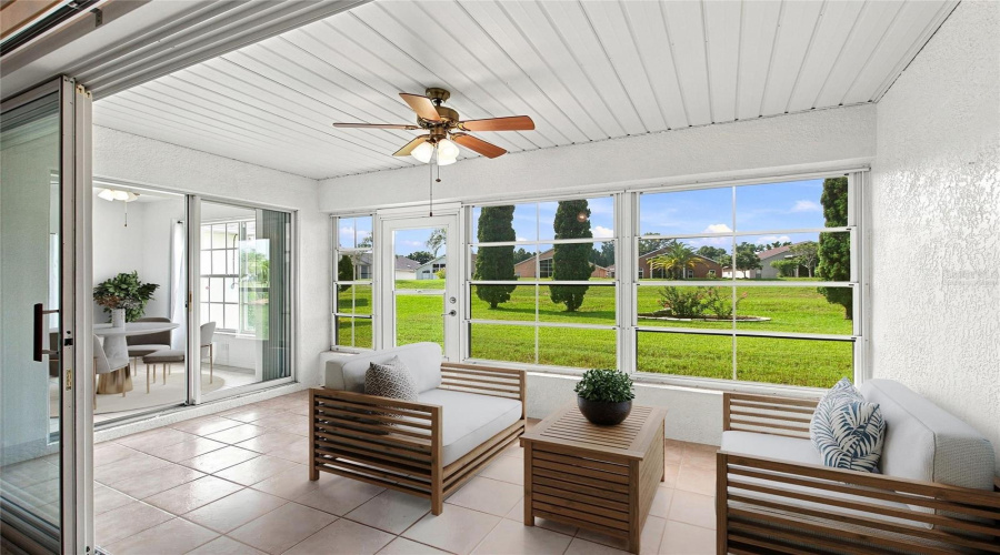 Virtually staged South-Facing Lanai & Kitchen eating area