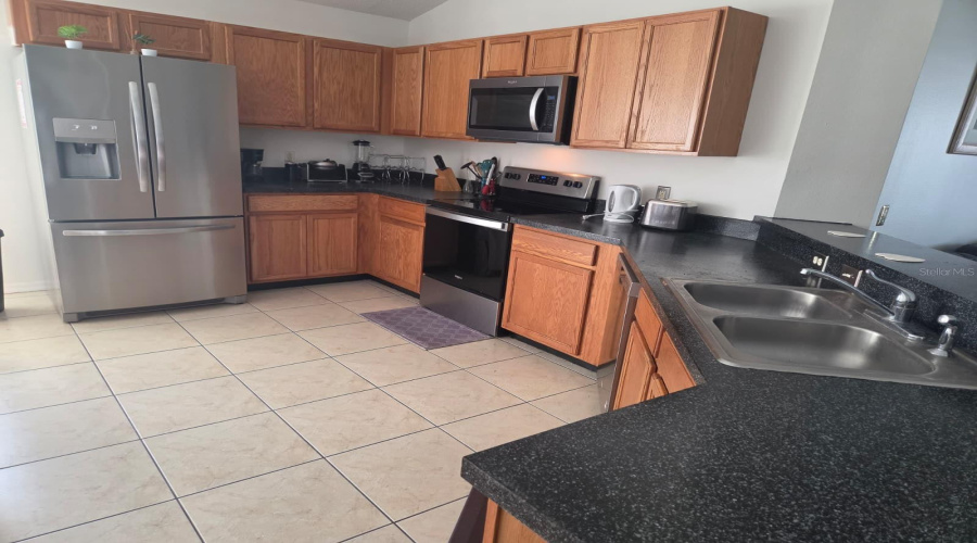 DAVENPORT, Florida 33897, 4 Bedrooms Bedrooms, ,3 BathroomsBathrooms,Residential,For Sale,PINE CONE,0,MFRO6435962