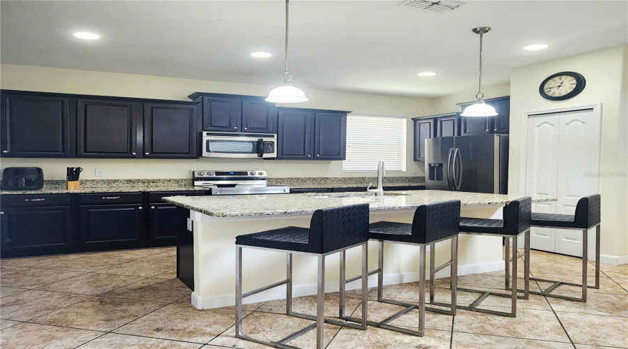 Kitchen Is Open To The Family Room.