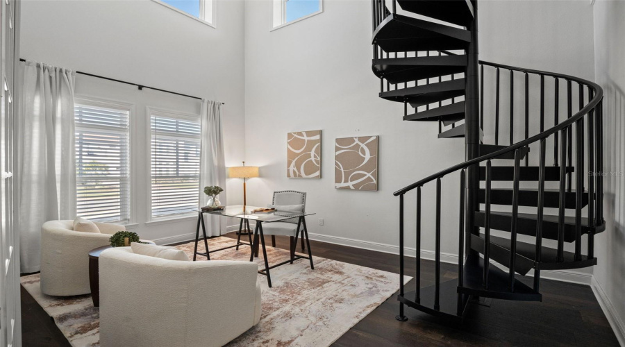 Office With French Doors And Spiral Staircase To Upstairs Loft