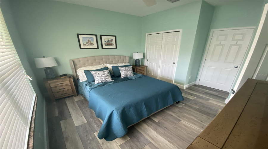 First-Floor Bedroom Featuring A Comfortable Queen-Size Bed.