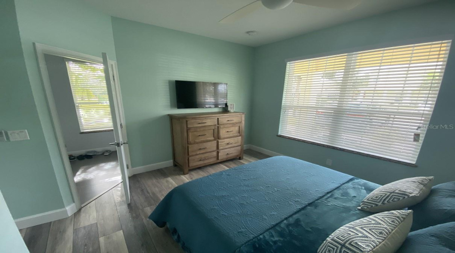 Alternate View Highlighting The Spacious Queen Bedroom And Natural Light.