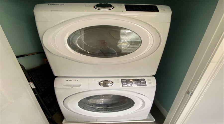 Full-Size Stacked Washer And Dryer For Added Convenience.