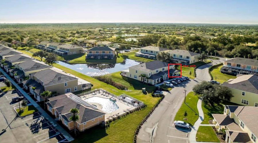Aerial View Showcasing The Property’s Convenient Location Near The Community Clubhouse And Amenities.