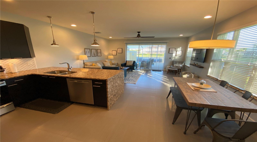 Open-Concept Kitchen Offering A Seamless Flow Into The Main Living And Dining Areas.
