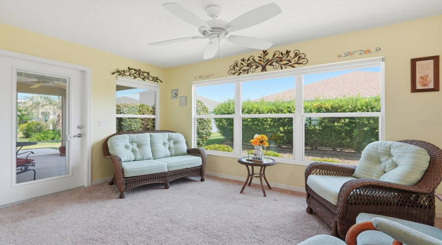 Lanai Has Shades And Door To Enclosed Screened Lanai