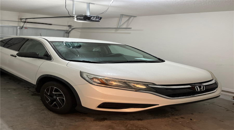 ! Car Garage Has Ample Space For An Owners Car And Storage