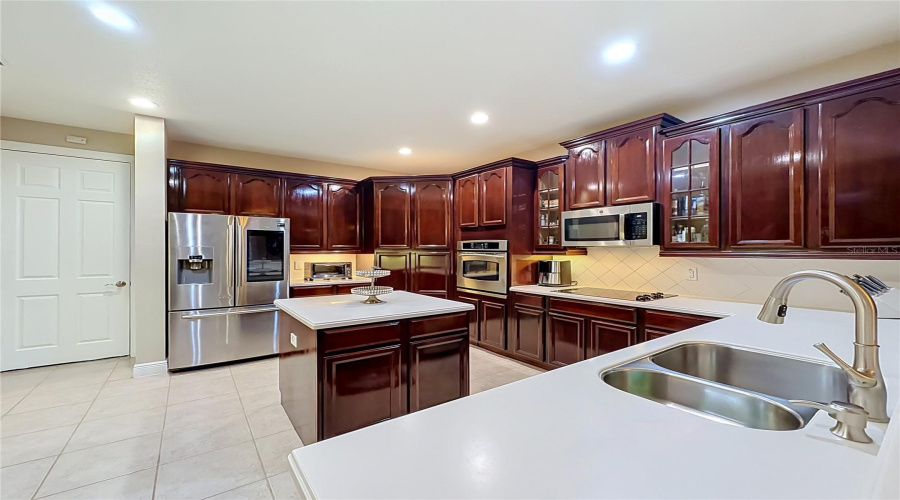 High End Kitchen, Double Sink, Loads Of Cabinets And Prep Space.
