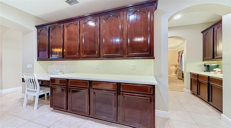 Built In Desk Area And View Of Butler'S Pantry.