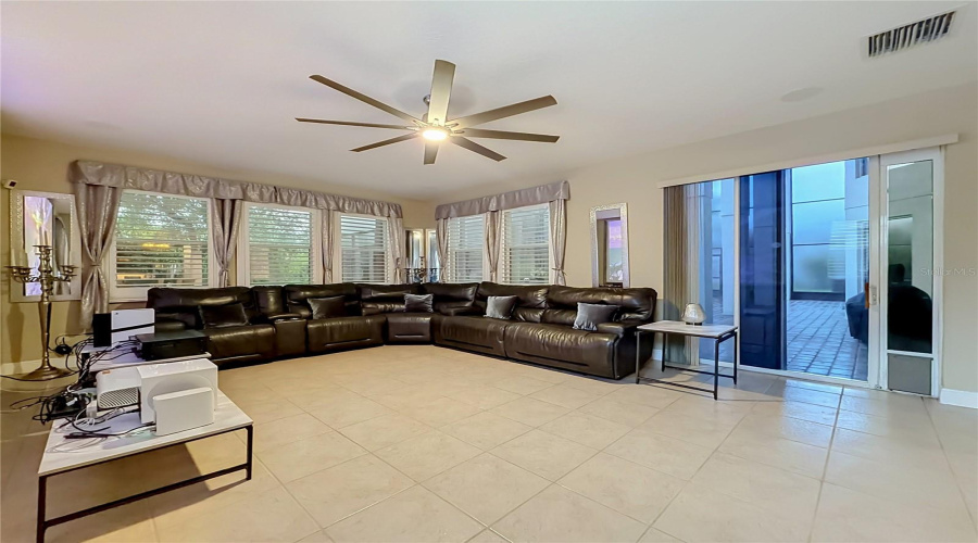 Great Room Off Kitchen And Dining/Breakfast Space. Sliding Door Access To Large Screen Enclosed &Amp; Paver Patio. Plantation Shutters Throughout Home.