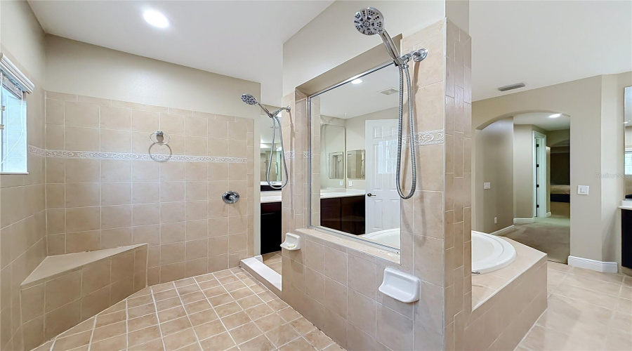 Large Walk-In Shower, Multiple Shower Heads And Built In Bench Seat.