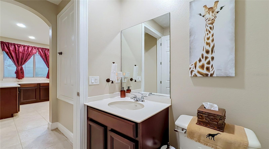 Downstairs 1/2 Bath Off Wet Bar Area.