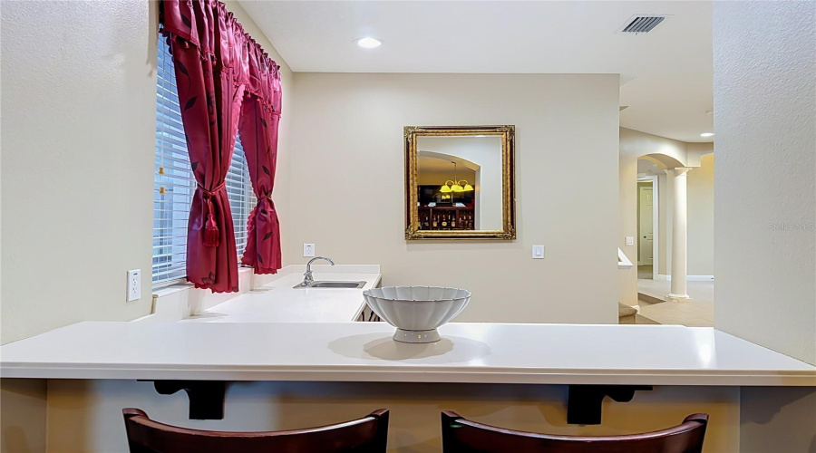 Additional Bar Seating Off Wet Bar Area.